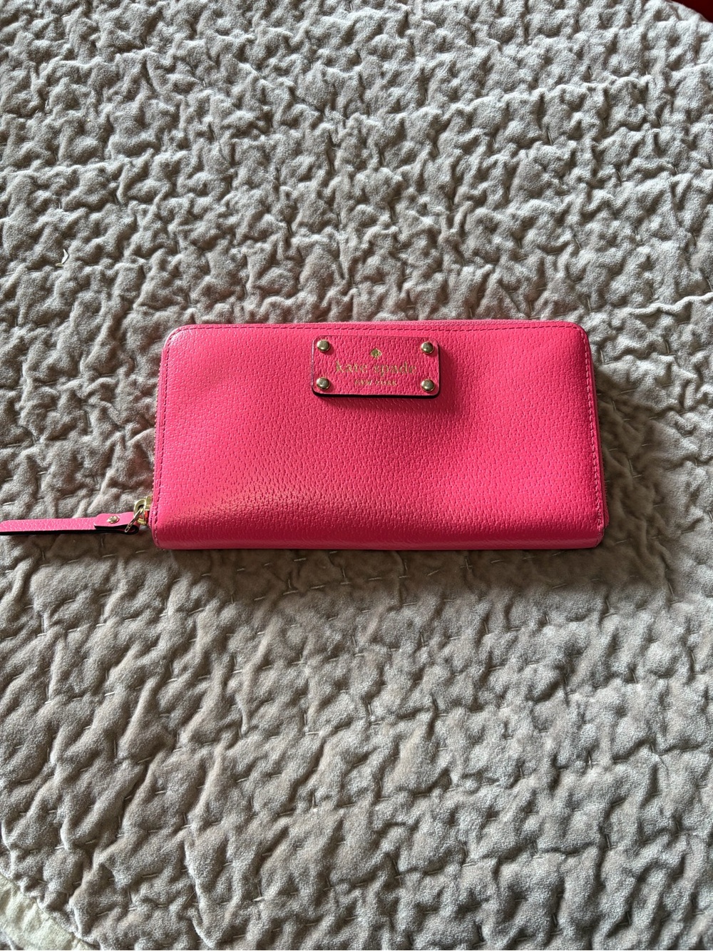kate spade vibrant pink zip-around wristlet wallet